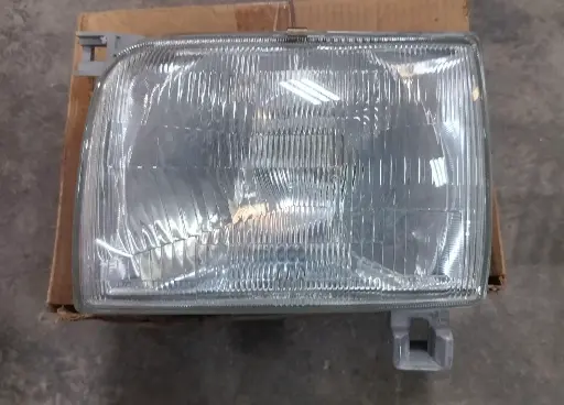 [260653S300MB] [แท้] - เสื้อไฟหน้า LH NISSAN FRONTIER D22 98 (ขาวล้วน) (ตาลึก)
